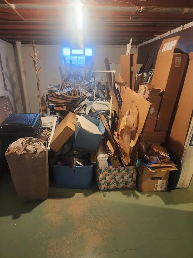 Roll-off dumpster container at job site for 15 Yard Dumpster Rental in Acton